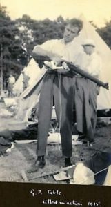 George Cable cleaning his rifle