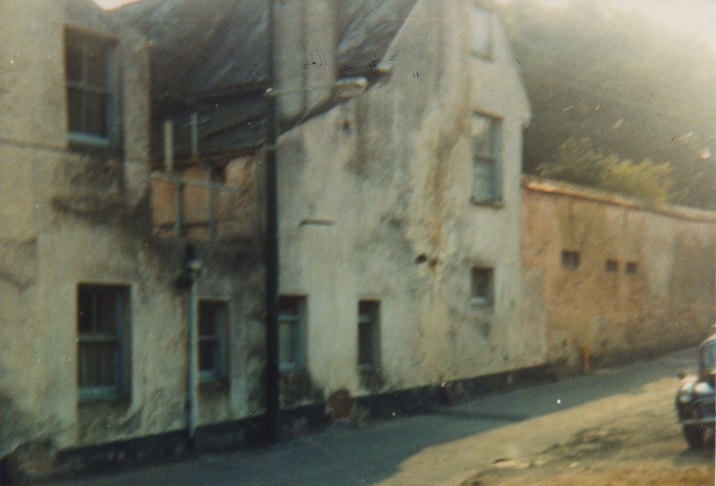 Colour photograph of Tapley House looking uphill towards Radway St.