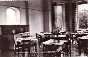 Black and white photograph of the dining room at Murley Grange, Bishopsteignton, when it was a hotel