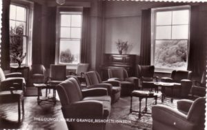 Black and white photograph of the lounge at Murley Grange Bishopsteignton, when it was a hotel