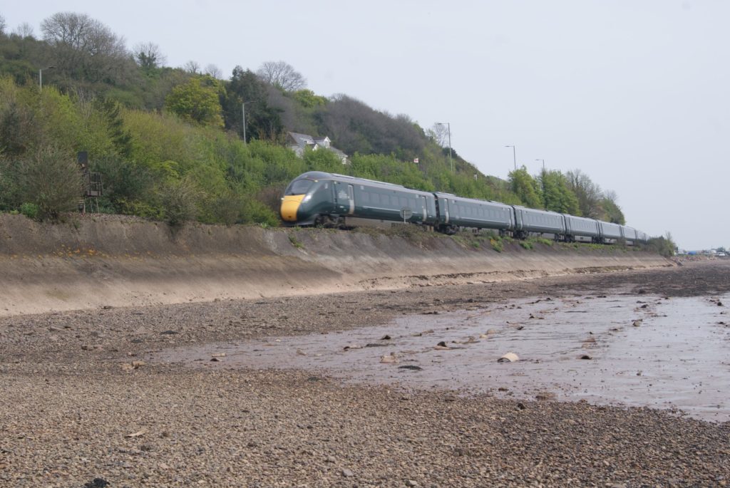 Modern train on riverside line
