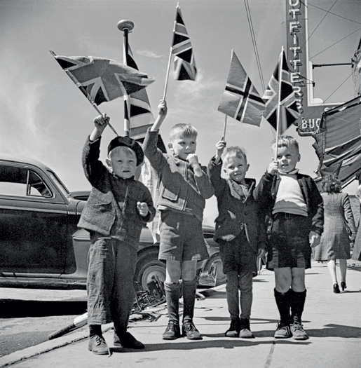 Children waving flags VE Day