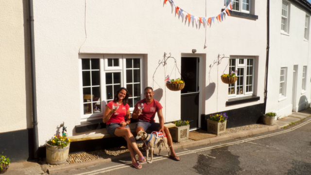 Kate, Dunstan and Reggie appropriately celebrating the occasion VE Day 75