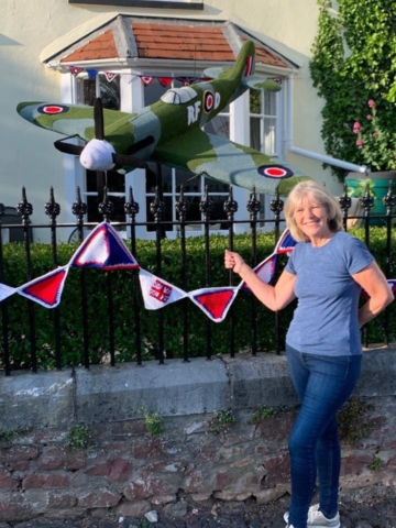 Poster girl Caroline with her amazing knitted spitfire tribute