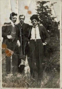Photograph of Philip Coombe (centre) and 2 unidentified men, around 1910.
