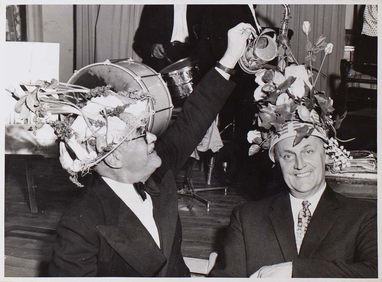 Photograph of two Bishopsteignton Players wearing Easter Bonnets