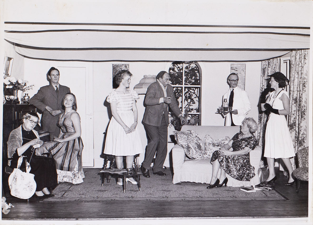 Photograph of cast members in a scene from the play 'Jane Steps Out'