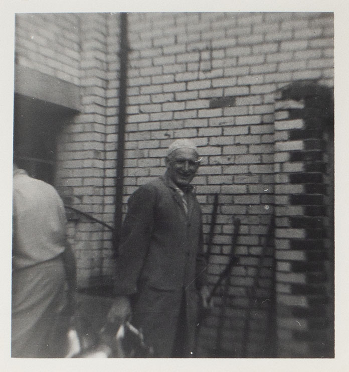 Photograph of Ernest Dawe at Ash Hill Farm, Bishopsteignton, inscribed in ink on reverse