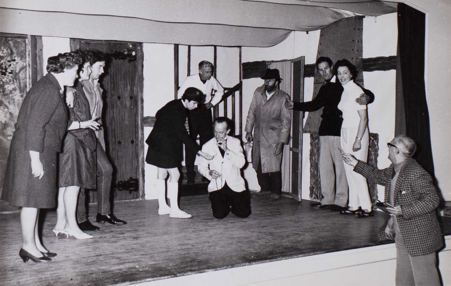 Photograph of the cast in a scene from the play 'Here We Come Gathering' presented by Bishopsteignton Players