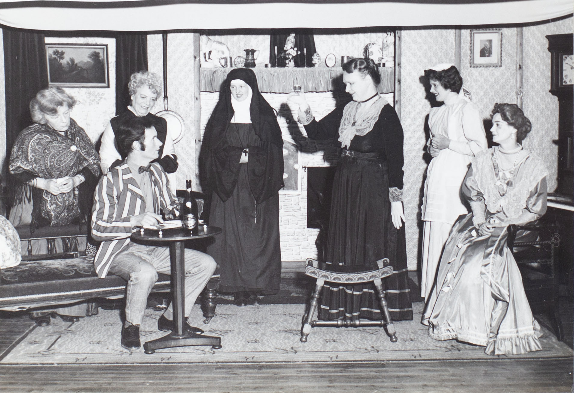 Photograph of some of the Bishopsteignton Players, in a scene from the 1960s play 'Ladies in Retirement'