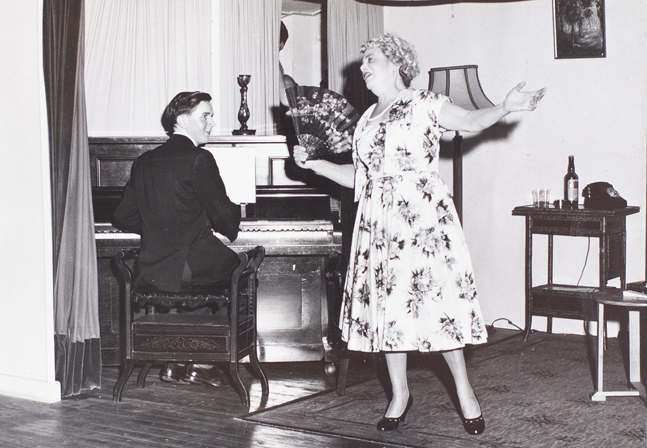 Photograph of actors in a scene from the 1960s play 'Blue Goose' performed by the Bishopsteignton Players