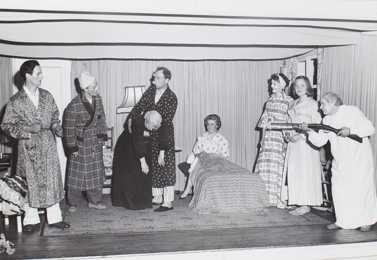 Photograph of actors in a scene from the 1960s play 'Jane Steps Out' performed by the Bishopsteignton Players