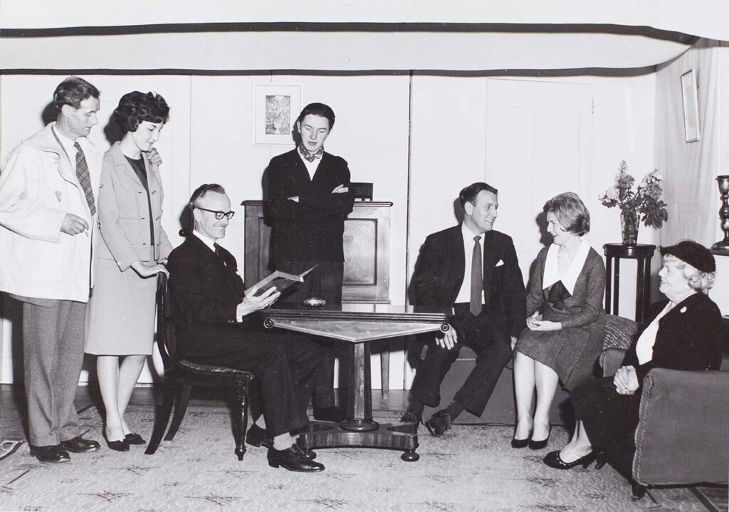 Photograph of actors in a scene from the play 'Love from a Stranger' performed by the Bishopsteignton Players in the 1960s