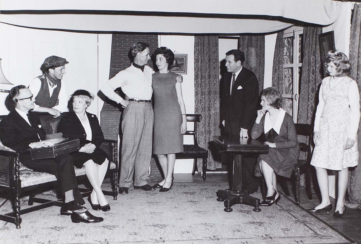 Photograph of actors in a scene from the play 'Love from a Stranger' performed by the Bishopsteignton Players in the 1960s