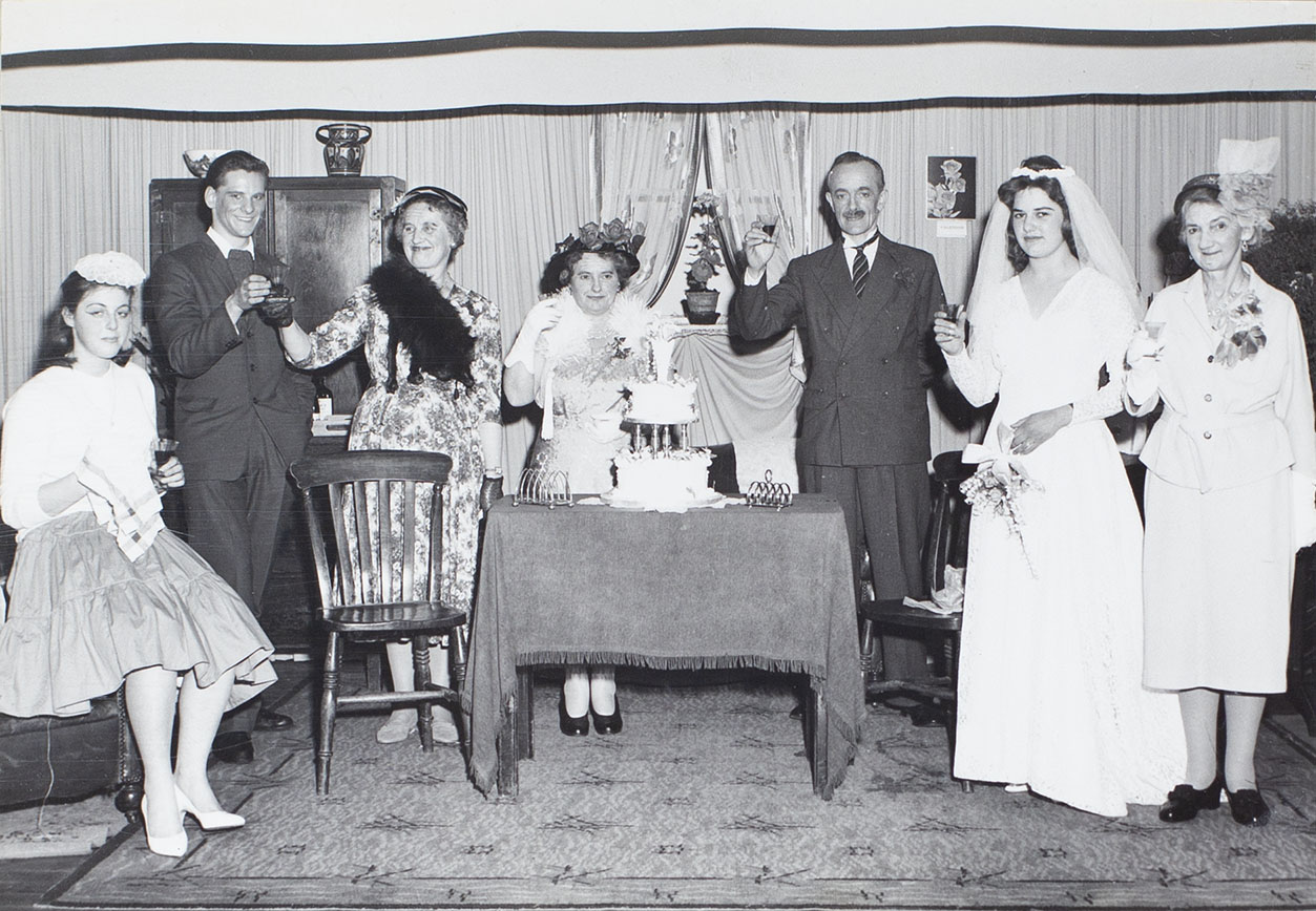 Photograph of actors in a scene from the play 'Orange Blossom' performed by the Bishopsteignton Players in the 1960s.