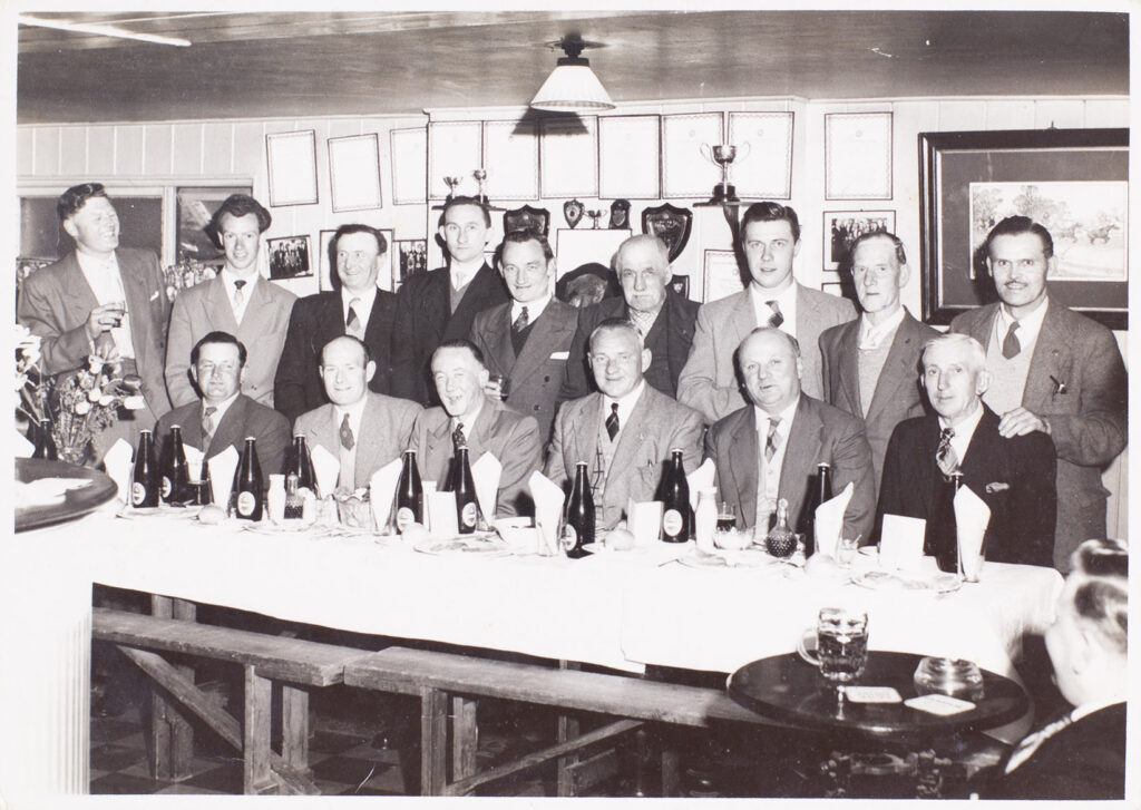 Photograph of a group at dinner at the Old Commercial Inn, Bishopsteignton front