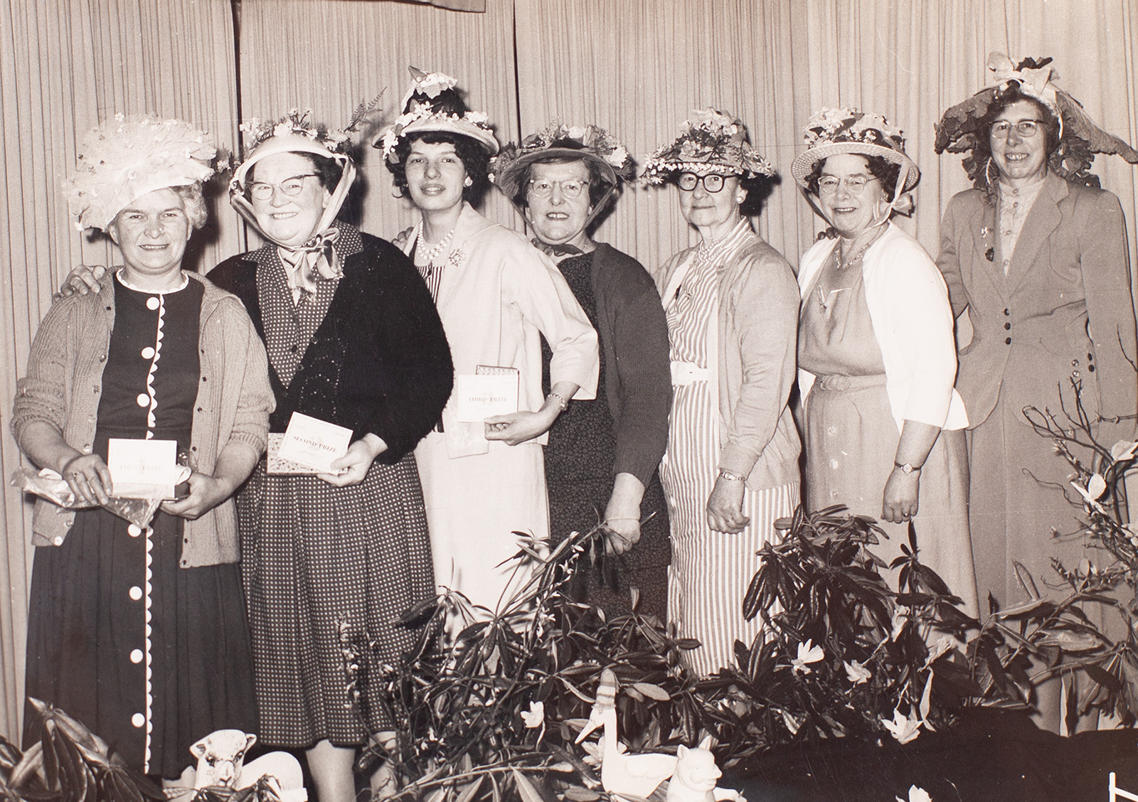 Photograph of named persons at the Easter Bonnet Parade
