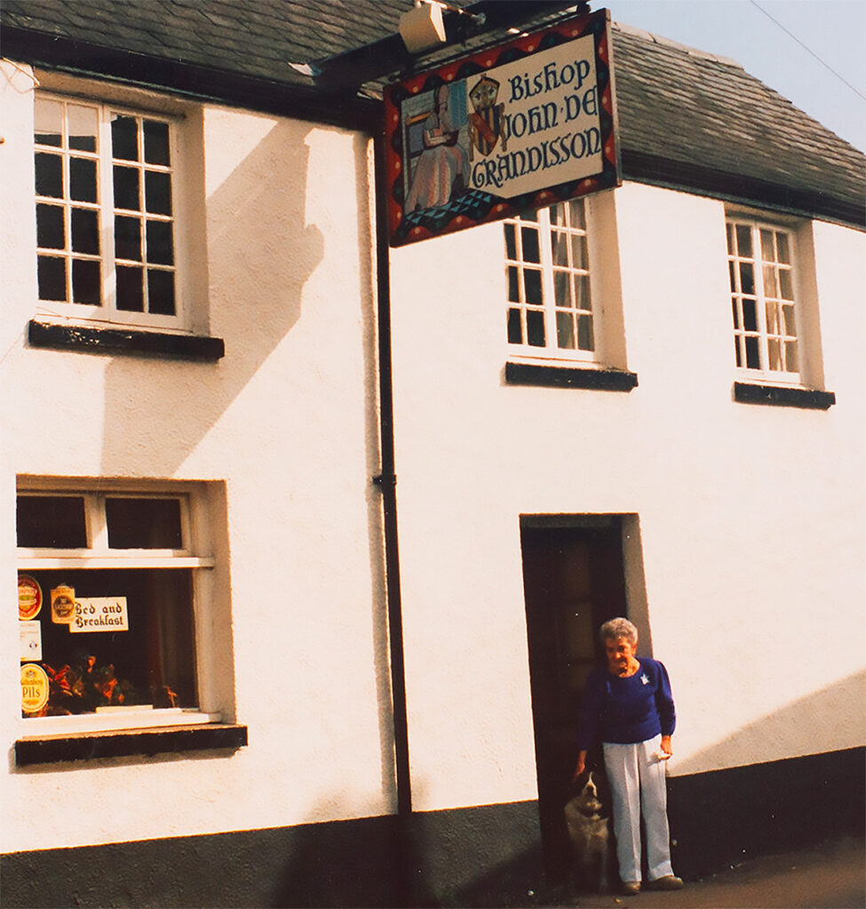 Dot and Bella at the door of the Bishop John de Grandisson