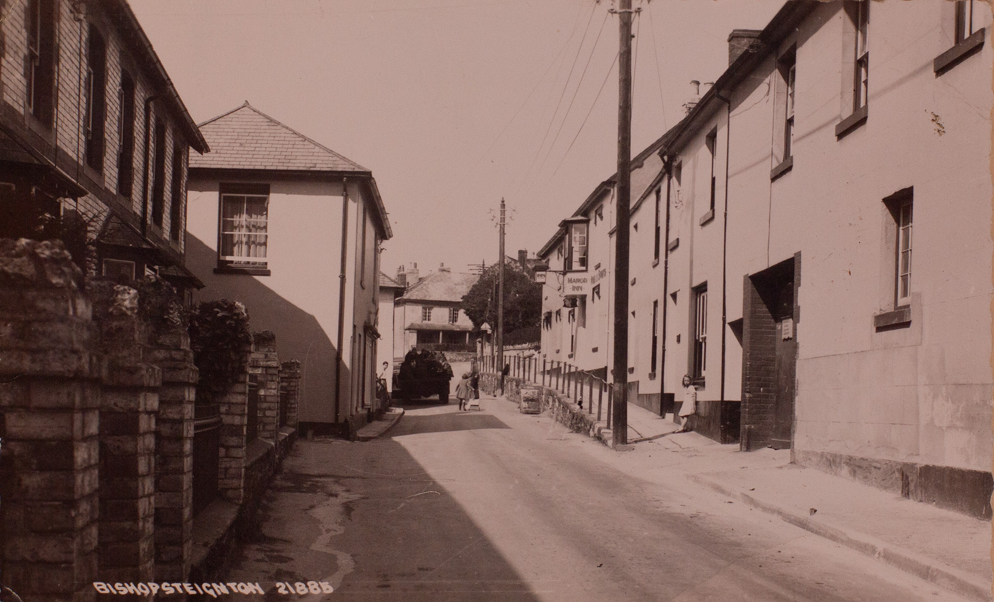 Postcard showing Fore Street, Bishopsteignton