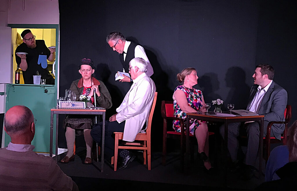 Photograph Bishopsteignton Players play 'Between Mouthfulls' 2019