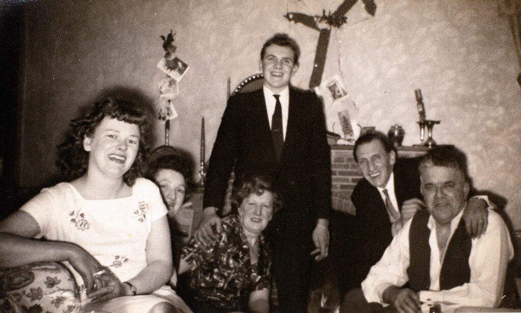 Photograph of the Landlady and patrons of The Manor Inn