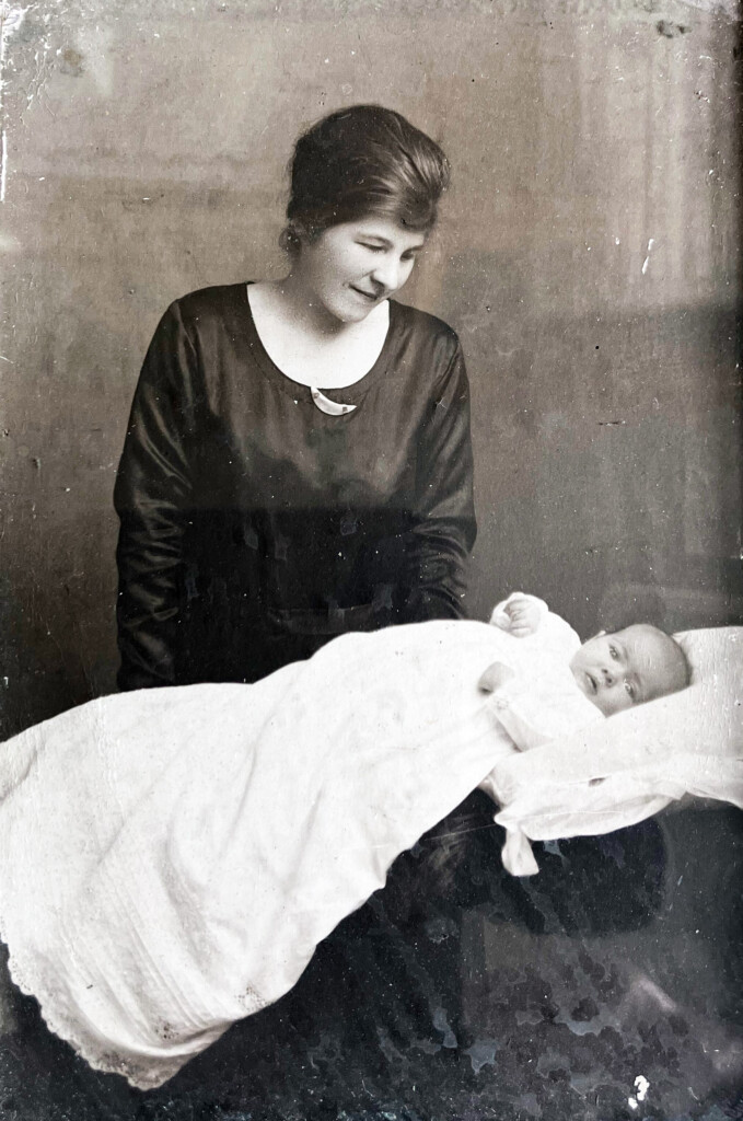 Photograph of Mary Overill (nèe Bovey) as a baby at her Christening 1922