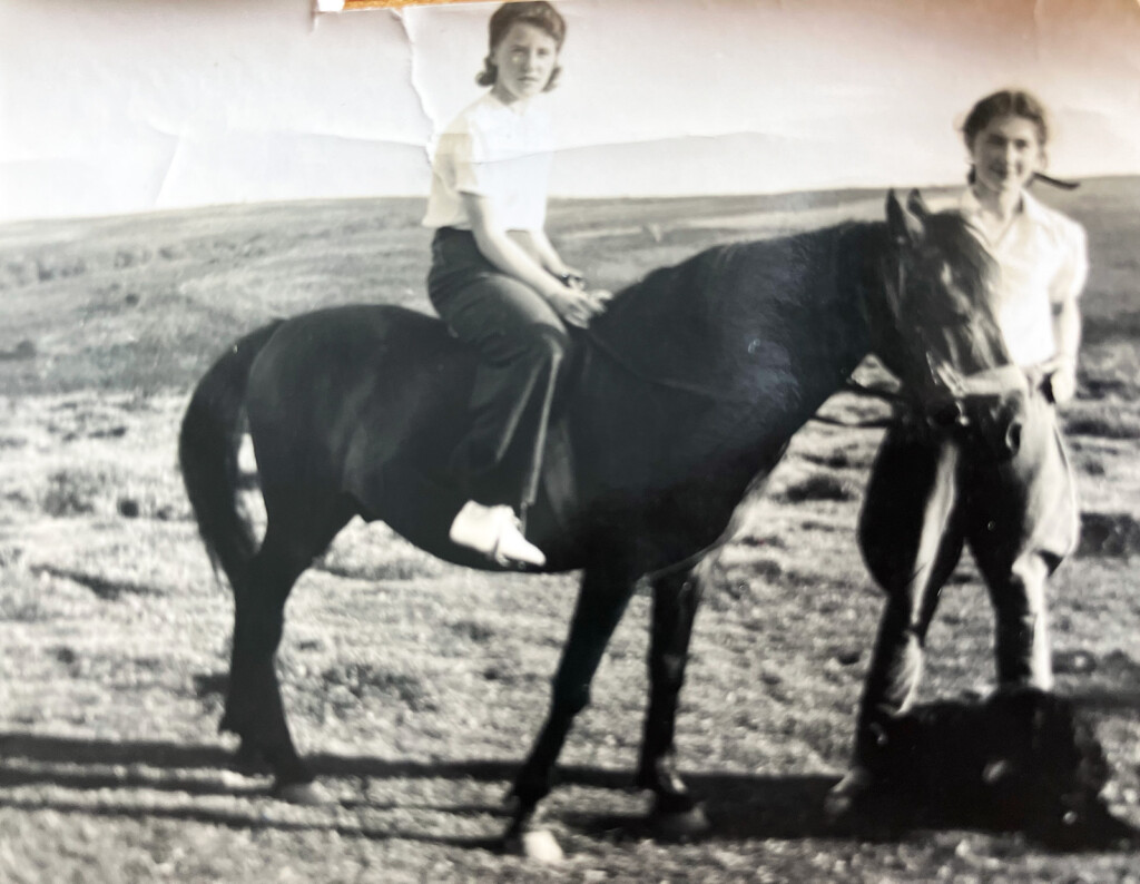Photograph of Mary Overill (nèe Bovey) with her pony in 1938
