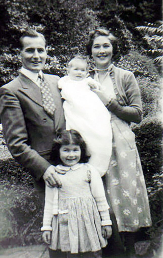 Photograph of Mary and Dick Overill with the young girls 1952